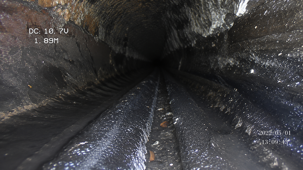 Eagle Trends technician performing a professional CCTV drain inspection in Abu Dhabi using a high-resolution drain camera to detect hidden pipe damage and blockages.